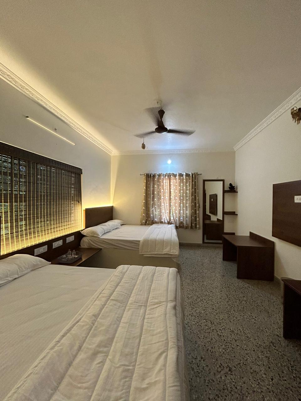 King-size bedroom at farmhouse near Udupi